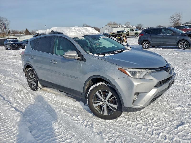 Photo 4 from auction – 2017 TOYOTA RAV4 XLE with VIN 2T3RFREV2HW635534