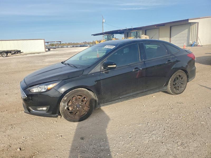 FORD FOCUS SE 2016 with VIN 1FADP3F28GL326411 - Photo from auction