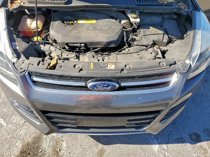 Photo 12 from auction – 2015 FORD ESCAPE TIT with VIN 1FMCU0JX3FUC59950