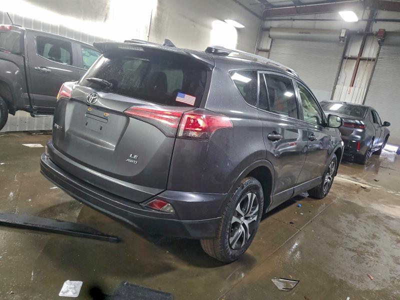 Photo 3 from auction – 2016 TOYOTA RAV4 LE with VIN JTMBFREV0GJ092537