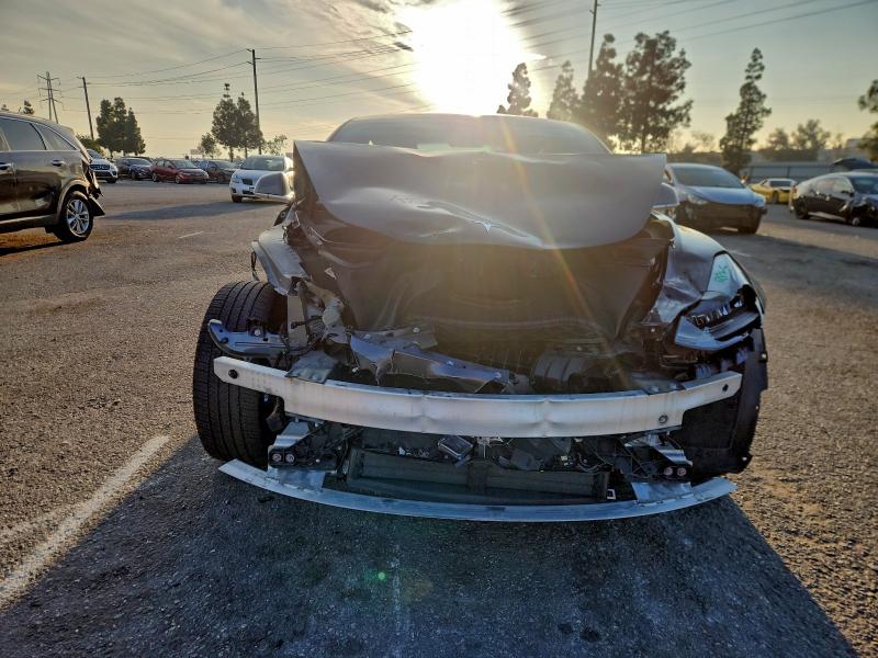 Photo 5 from auction – 2018 TESLA MODEL 3 with VIN 5YJ3E1EA9JF014049