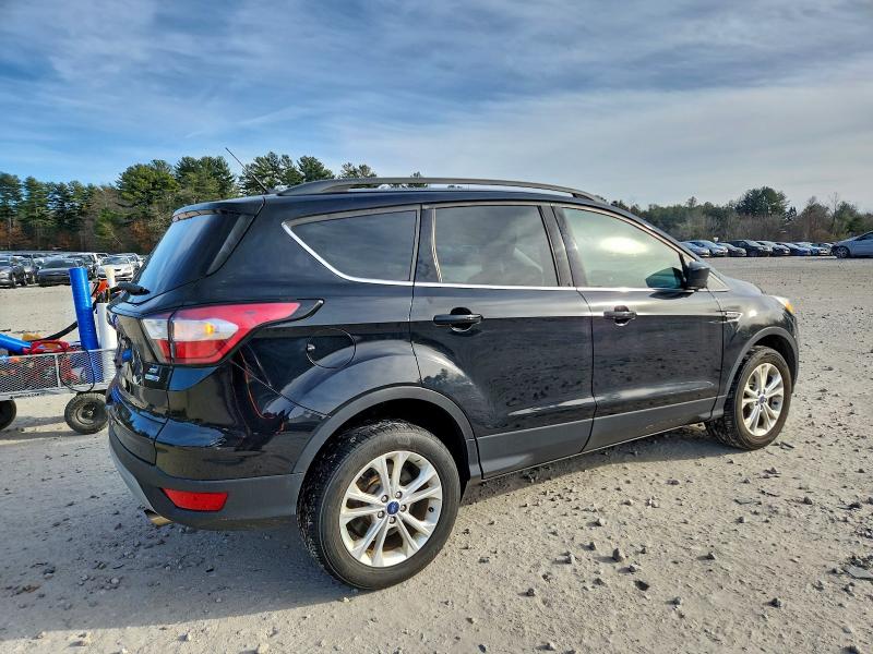 Photo 3 from auction – 2018 FORD ESCAPE SE with VIN 1FMCU9GD8JUB00982