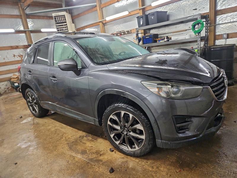 Photo 4 from auction – 2016 MAZDA CX-5 GT with VIN JM3KE2DY1G0711522