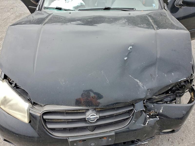Photo 11 from auction – 2000 NISS MAXIMA with VIN JN1CA31A6YT028448
