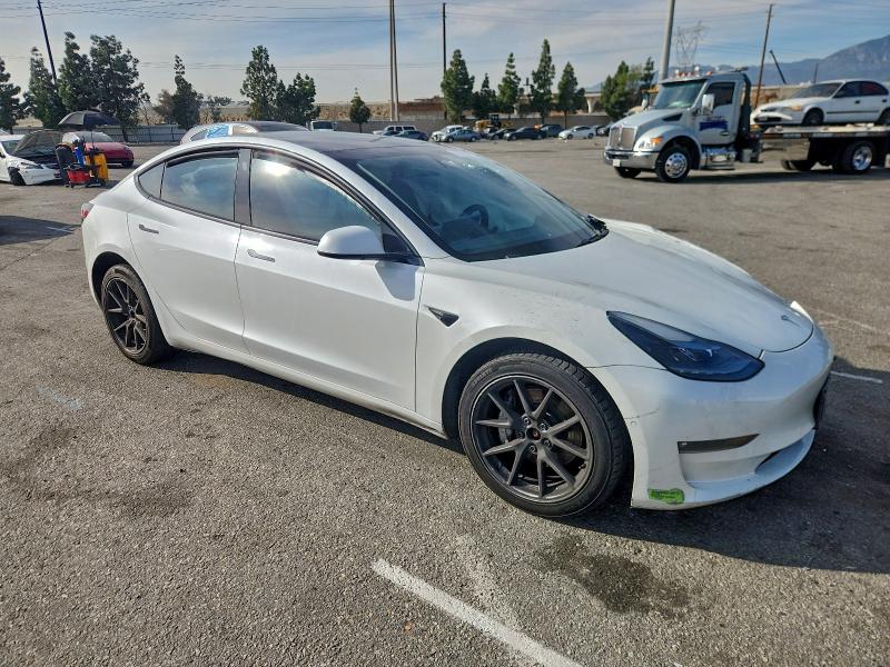 Photo 4 from auction – 2021 TESLA MODEL 3 with VIN 5YJ3E1EB7MF879731