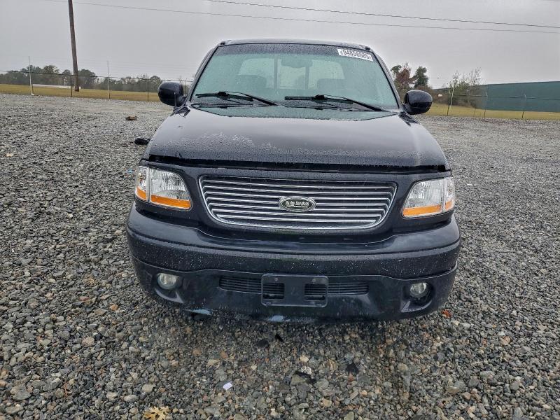 Photo 5 from auction – 2003 FORD F150 SUPER with VIN 1FTRW07343KB41880