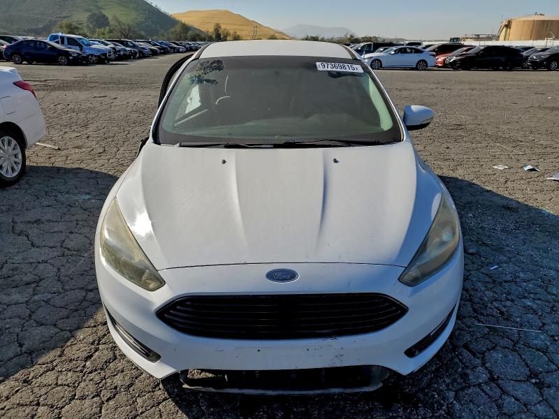 Photo 5 from auction – 2016 FORD FOCUS SE with VIN 1FADP3FE9GL331997