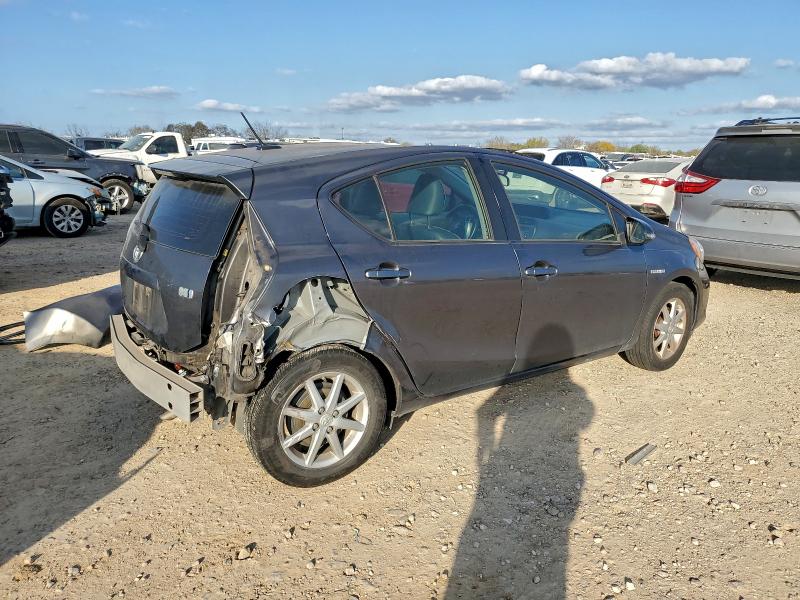 Photo 3 from auction – 2014 TOYOTA PRIUS C with VIN JTDKDTB3XE1567453