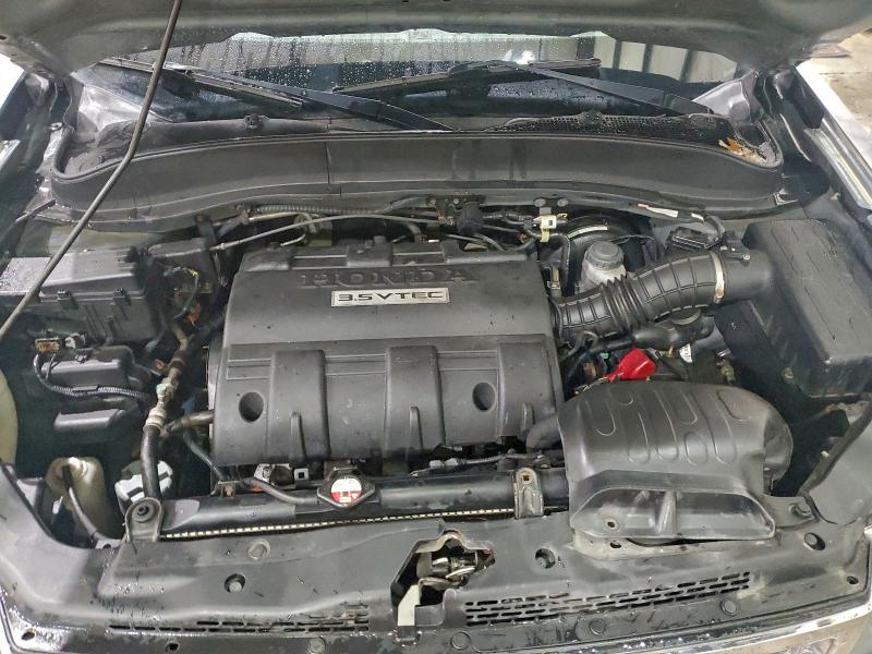 Photo 11 from auction – 2009 HONDA RIDGELINE with VIN 5FPYK16509B104077