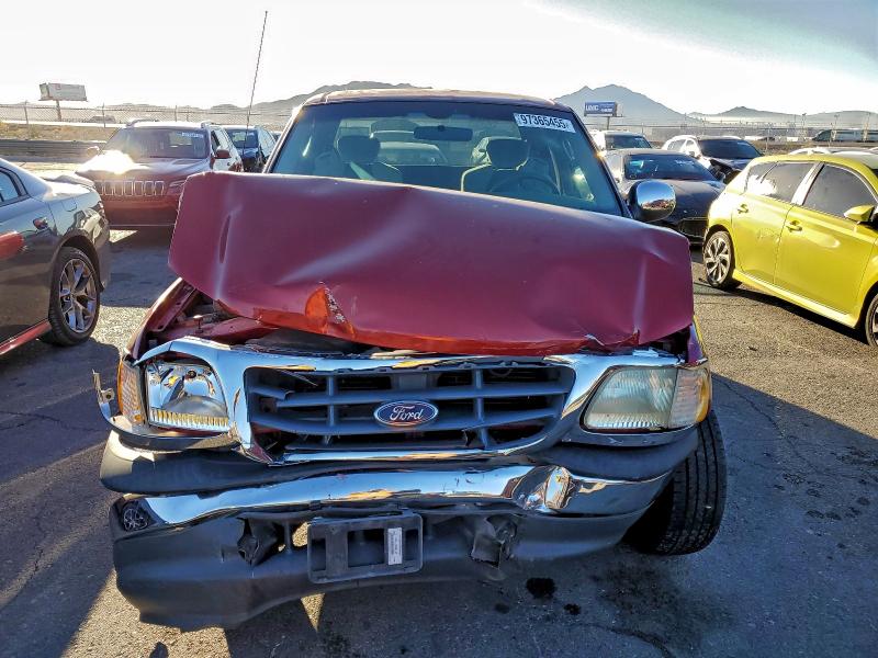Photo 5 from auction – 2002 FORD F150 with VIN 1FTRX17202NB49188