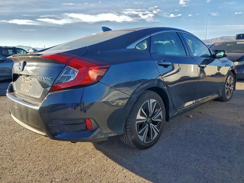 Photo 3 from auction – 2017 HONDA CIVIC EX with VIN 2HGFC1F38HH646453