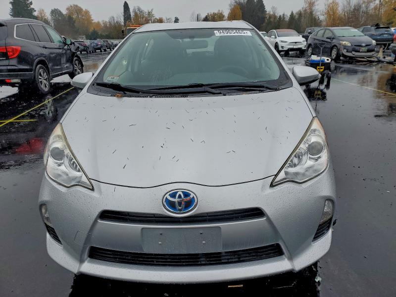 Photo 5 from auction – 2014 TOYOTA PRIUS C with VIN JTDKDTB35E1564637