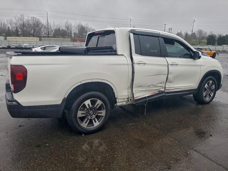 Photo 3 from auction – 2019 HONDA RIDGELINE with VIN 5FPYK3F75KB005547