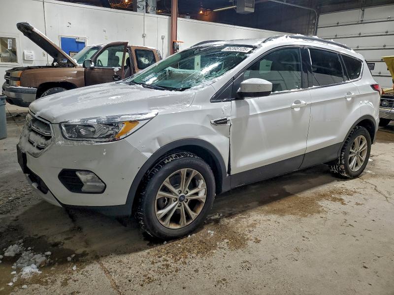 Photo 1 from auction – 2018 FORD ESCAPE SE with VIN 1FMCU9GD0JUD07236