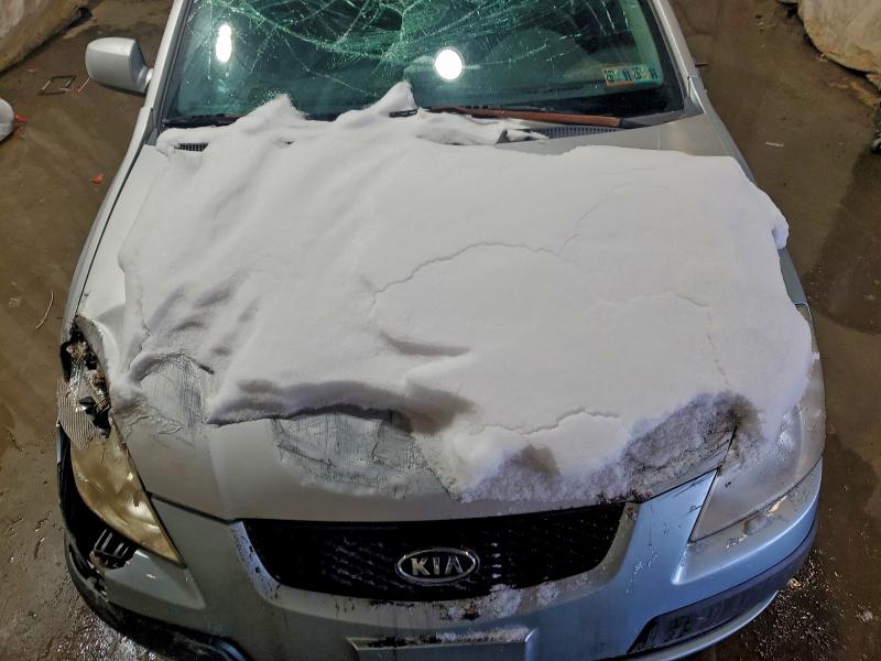Photo 11 from auction – 2006 KIA RIO with VIN KNADE123266101608