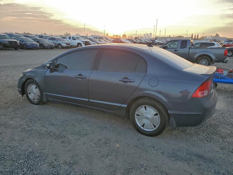 Photo 2 from auction – 2007 HONDA CIVIC HYBR with VIN JHMFA36287S015909