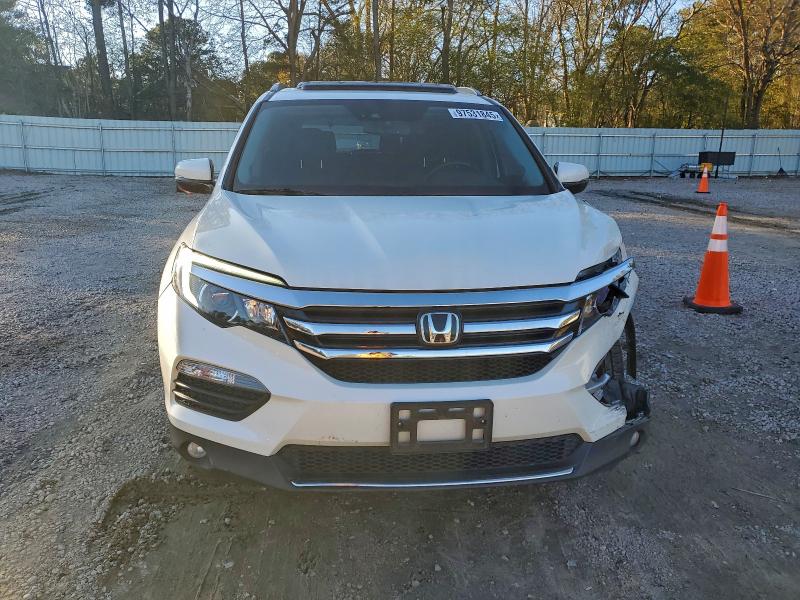 Photo 5 from auction – 2018 HONDA PILOT ELIT with VIN 5FNYF6H00JB001046