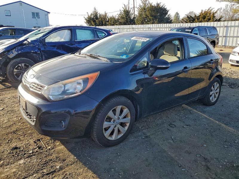 KIA RIO EX 2014 with VIN KNADN5A37E6376527 - Photo from auction