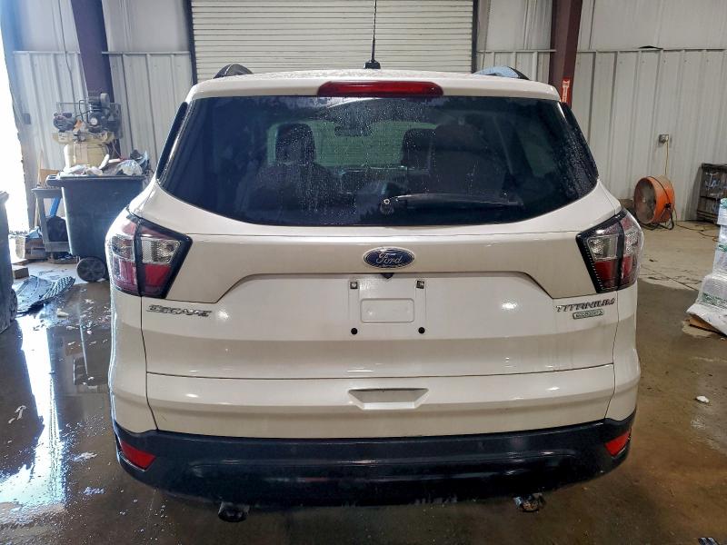 Photo 6 from auction – 2017 FORD ESCAPE TIT with VIN 1FMCU0J97HUD65368