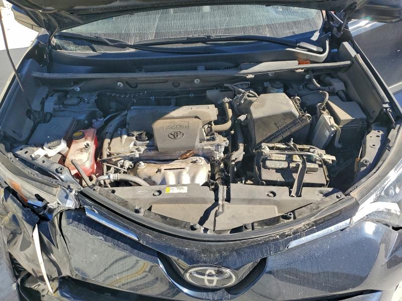 Photo 12 from auction – 2018 TOYOTA RAV4 LE with VIN 2T3ZFREV3JW435221