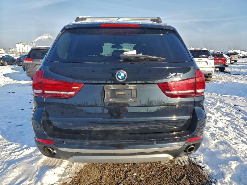 Photo 6 from auction – 2015 BMW X5 XDRIVE3 with VIN 5UXKS4C59F0N05897