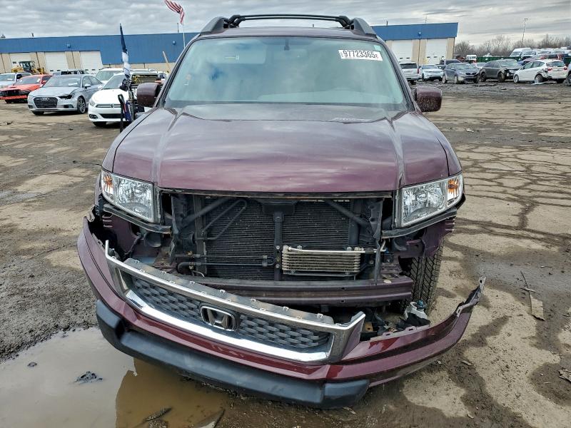 Photo 5 from auction – 2013 HONDA RIDGELINE with VIN 5FPYK1F49DB004852