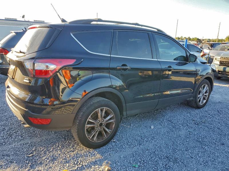 Photo 3 from auction – 2018 FORD ESCAPE with VIN 1FMCU0HD3JUB68052