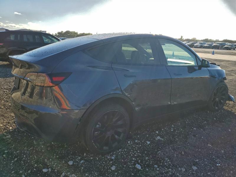 Photo 3 from auction – 2022 TESLA MODEL Y with VIN 7SAYGDEE6NF480051