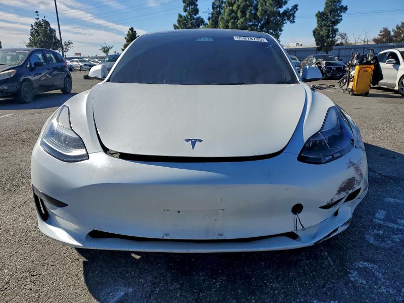 Photo 5 from auction – 2023 TESLA MODEL 3 with VIN 5YJ3E1EA8PF599179