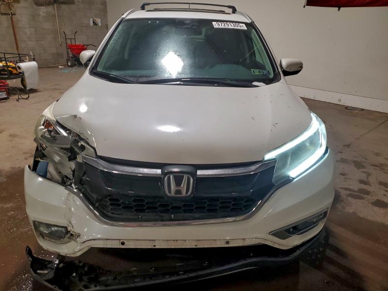 Photo 12 from auction – 2015 HONDA CR-V TOURI with VIN 5J6RM4H91FL028056