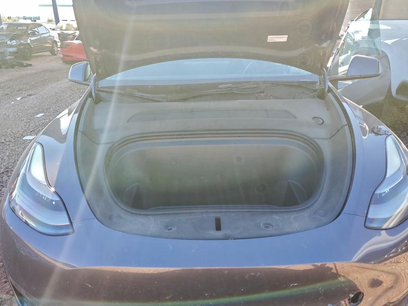 Photo 11 from auction – 2023 TESLA MODEL Y with VIN 7SAYGDEE6PF618576