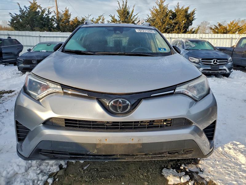 Photo 5 from auction – 2018 TOYOTA RAV4 LE with VIN JTMBFREV5JJ239328