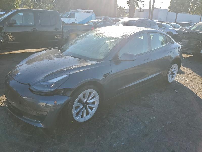 TESLA MODEL 3 2022 with VIN 5YJ3E1EAXNF304449 - Photo from auction