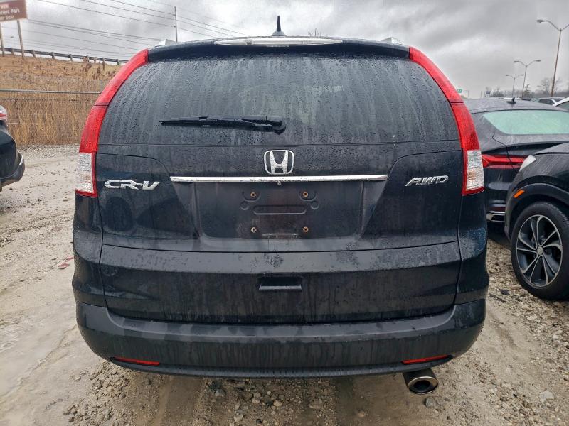 Photo 6 from auction – 2014 HONDA CR-V EXL with VIN 5J6RM4H73EL070189