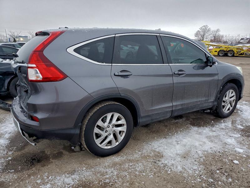 Photo 3 from auction – 2015 HONDA CR-V EX with VIN 2HKRM4H50FH102476