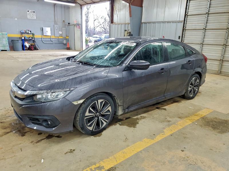 Photo 1 from auction – 2018 HONDA CIVIC EX with VIN 2HGFC1F34JH644124