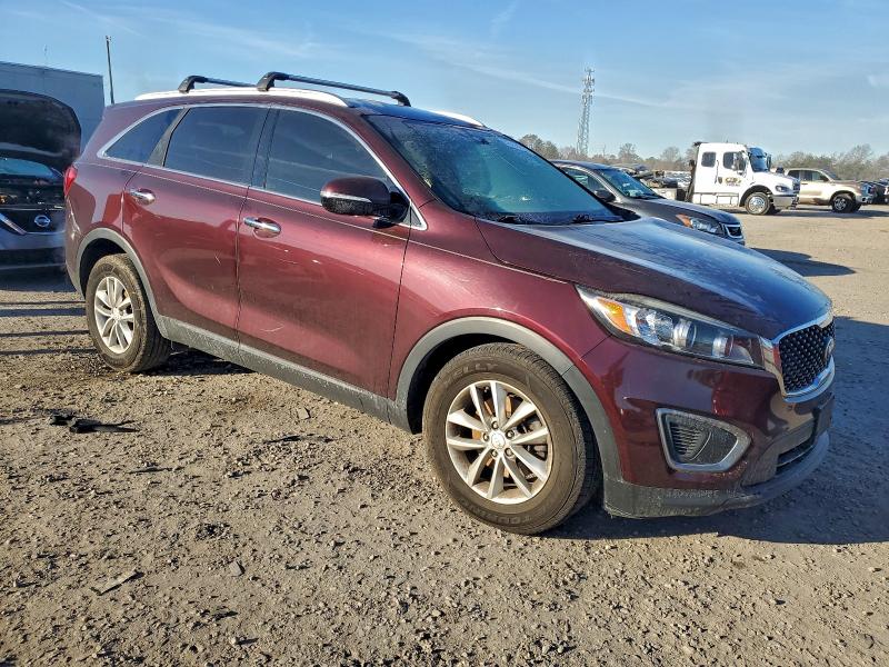 Photo 4 from auction – 2016 KIA SORENTO LX with VIN 5XYPG4A38GG115735