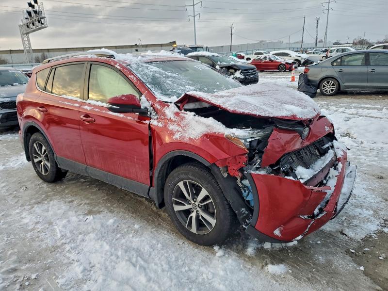 Photo 4 from auction – 2017 TOYOTA RAV4 XLE with VIN JTMRFREV3HJ119178