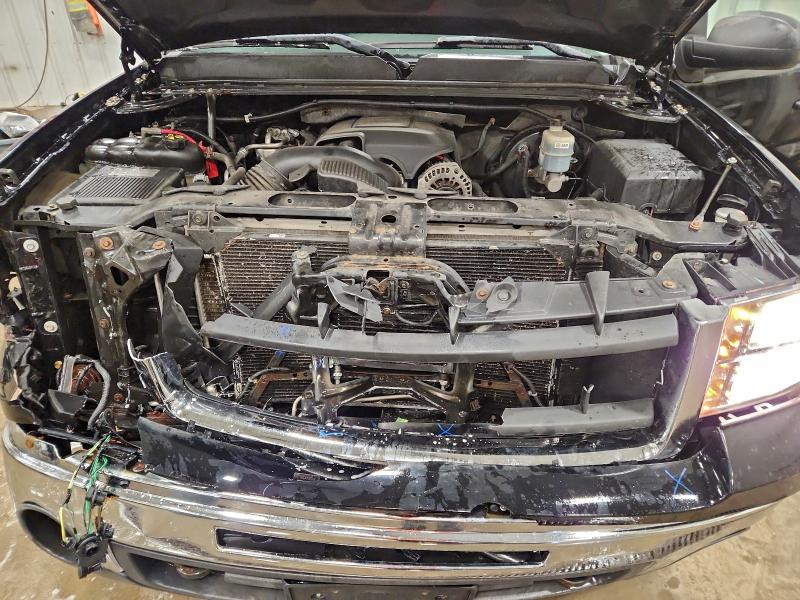 Photo 11 from auction – 2011 GMC SIERRA K15 with VIN 1GTR2VE39BZ284731