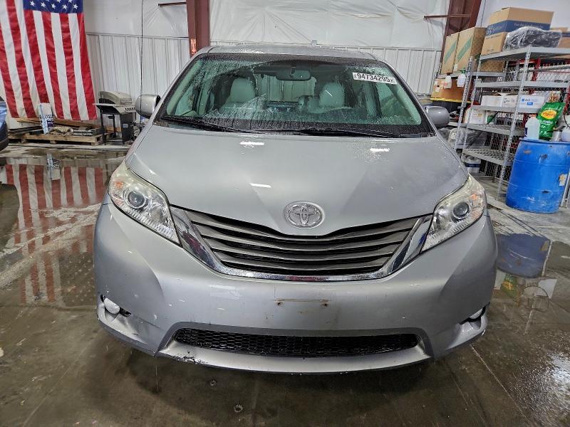 Photo 5 from auction – 2014 TOYOTA SIENNA XLE with VIN 5TDYK3DC0ES449900