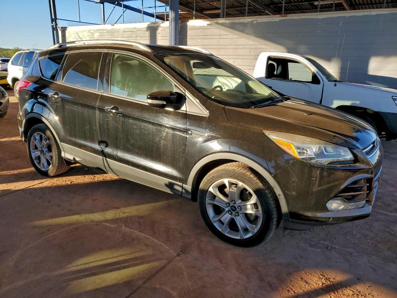 Photo 4 from auction – 2016 FORD ESCAPE with VIN 1FMCU9JXXGUA65101