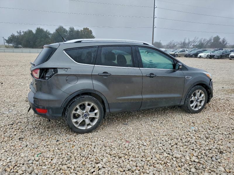 Photo 3 from auction – 2016 FORD ESCAPE TIT with VIN 1FMCU0J99GUA28862