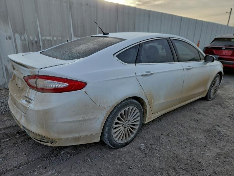 Photo 3 from auction – 2016 FORD FUSION TIT with VIN 3FA6P0K97GR347018