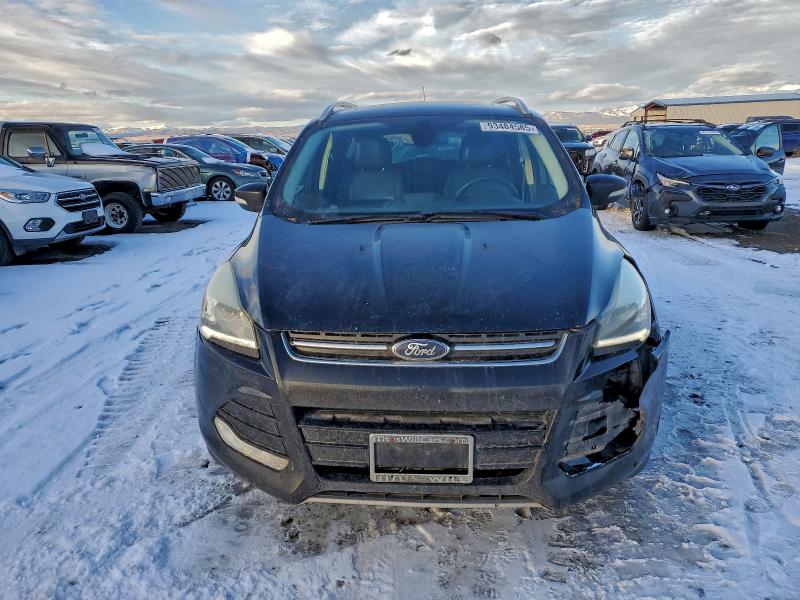 Photo 5 from auction – 2016 FORD ESCAPE TIT with VIN 1FMCU9J96GUA76484