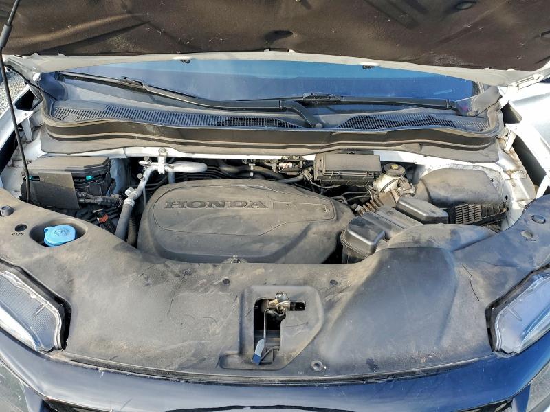 Photo 12 from auction – 2021 HONDA PASSPORT E with VIN 5FNYF7H58MB006744