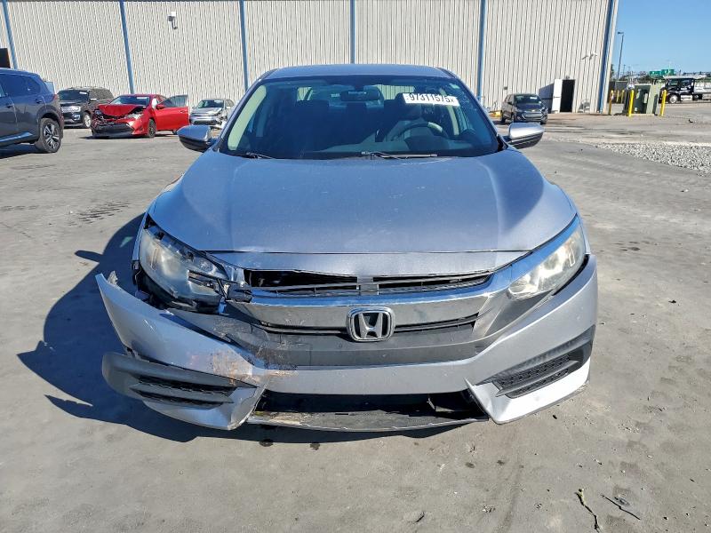 Photo 5 from auction – 2017 HONDA CIVIC LX with VIN 19XFC2F57HE064572