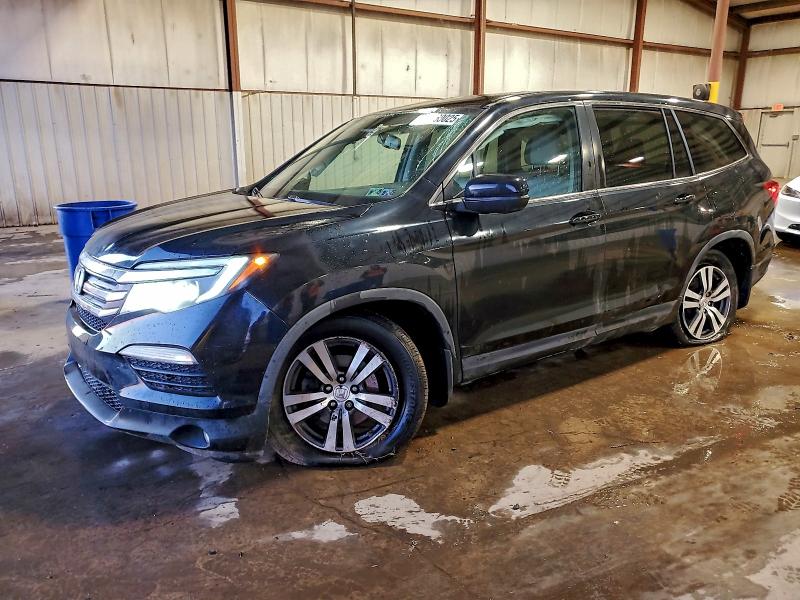 HONDA PILOT EXL 2016 with VIN 5FNYF6H52GB004504 - Photo from auction