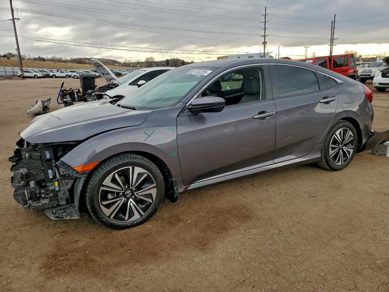 HONDA CIVIC EXL 2016 with VIN 19XFC1F73GE043969 - Photo from auction