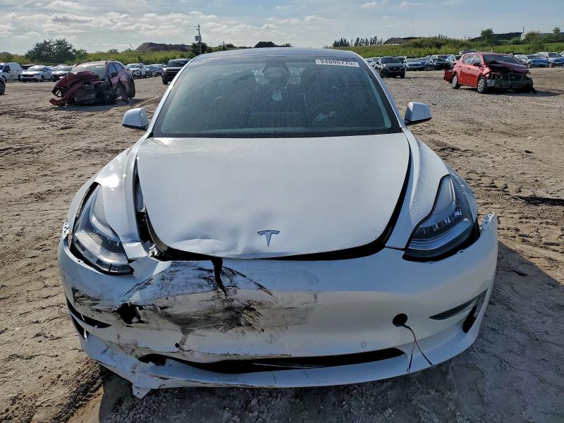 Photo 5 from auction – 2021 TESLA MODEL 3 with VIN 5YJ3E1EA6MF861423