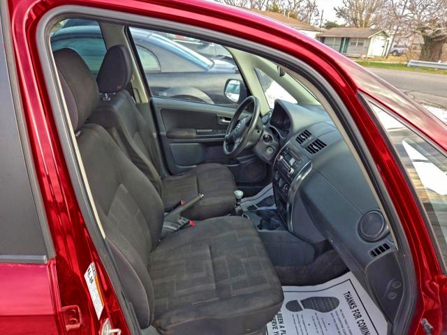 Photo 5 from auction – 2012 SUZUKI SX4 LE with VIN JS2YC5A34C6300311
